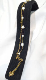 دستبند دولاین ستاره سنگی مرواریدی بازنجیر خلخال مشخصات : زنجیر ستاره سنگی 15 سانت زنجیر خلخال 15/2 سانت زنجیر سایز 4 سانت آویز قلب انتهای دستبند + قفل + حلقه اتصال دستبند کاملا استیل آبکاری طلایی رنگ ثابت بدون حساسیت کانال محصولات و کدرهگیری واتساپ https://whatsapp.com/channel/0029Vb6G4LDA89MaeB17xp18 کانال محصولات جدید پیام رسان ایتا https://eitaa.com/kharraziaramis شماره واتساپ و پاسخگویی ( ساعات کاری  9 تا 14 ) 09100772050 دستبند دو لاین استیل دستبند دوتایی استیل دستبند دخترانه دولاین دستبند زنانه دولاین دستبند استیل دستبند استیل ونکلیف دستبند ون کلیف دستبند دخترانه ونکلیف دستبند زنانه ونکلیف دولاین خرازی آرامیس