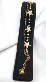 دستبند دولاین طرح ونکلیف بازنجیر خلخال مشخصات : زنجیر ونکلیف سنگی 15 سانت زنجیر خلخال 15/2 سانت زنجیر سایز 4 سانت آویز قلب انتهای دستبند + قفل + حلقه اتصال دستبند کاملا استیل آبکاری طلایی رنگ ثابت بدون حساسیت کانال محصولات و کدرهگیری واتساپ https://whatsapp.com/channel/0029Vb6G4LDA89MaeB17xp18 کانال محصولات جدید پیام رسان ایتا https://eitaa.com/kharraziaramis شماره واتساپ و پاسخگویی ( ساعات کاری  9 تا 14 ) 09100772050 دستبند دو لاین استیل دستبند دوتایی استیل دستبند دخترانه دولاین دستبند زنانه دولاین دستبند استیل دستبند استیل ونکلیف دستبند ون کلیف دستبند دخترانه ونکلیف دستبند زنانه ونکلیف دولاین خرازی آرامیس