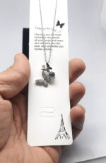 گردنبند به صد زبان دوستت دارم پروانه کد343 مشخصات محصول : ابعاد کامل محصول :  باحلقه گردنبندی زنجیر استیل رنگ ثابت بدون حساسیت سایز 45 سانت با زنجیر تنظیم با نگین به صد زبان دوستت دارم کانال محصولات جدید پیام رسان ایتا https://eitaa.com/kharraziaramis مشاهده کدرهگیری پیام رسان ایتا https://eitaa.com/postkharraziaramis کانال واتساپ https://whatsapp.com/channel/0029Vb6G4LDA89MaeB17xp18 شماره واتساپ و پاسخگویی ( ساعات کاری 9 تا 13 – 17 تا 21 ) 09100772050 گردنبند صدزبان گردنبند صد زبان دوست دارم گردنبند به صدزبان دوستت دارم گردنبند استیل به صد زبان گردنبند رنگ ثابت به صد زبان I love you in a hundred languages CustoMyLove™ I Love you in 100 Languages Necklace Images may be