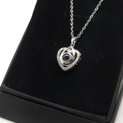 گردنبند به صد زبان دوستت دارم قلب کد329 مشخصات محصول : ابعاد کامل محصول :  باحلقه گردنبندی زنجیر استیل رنگ ثابت بدون حساسیت سایز 45 سانت با زنجیر تنظیم با نگین به صد زبان دوستت دارم کانال محصولات جدید پیام رسان ایتا https://eitaa.com/kharraziaramis مشاهده کدرهگیری پیام رسان ایتا https://eitaa.com/postkharraziaramis کانال واتساپ https://whatsapp.com/channel/0029Vb6G4LDA89MaeB17xp18 شماره واتساپ و پاسخگویی ( ساعات کاری 9 تا 13 – 17 تا 21 ) 09100772050 گردنبند صدزبان گردنبند صد زبان دوست دارم گردنبند به صدزبان دوستت دارم گردنبند استیل به صد زبان گردنبند رنگ ثابت به صد زبان I love you in a hundred languages CustoMyLove™ I Love you in 100 Languages Necklace Images may be