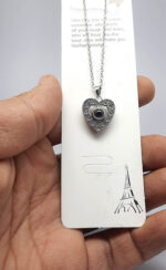 گردنبند به صد زبان دوستت دارم قلب کد327 مشخصات محصول : ابعاد کامل محصول :  باحلقه گردنبندی زنجیر استیل رنگ ثابت بدون حساسیت سایز 45 سانت با زنجیر تنظیم با نگین به صد زبان دوستت دارم کانال محصولات جدید پیام رسان ایتا https://eitaa.com/kharraziaramis مشاهده کدرهگیری پیام رسان ایتا https://eitaa.com/postkharraziaramis کانال واتساپ https://whatsapp.com/channel/0029Vb6G4LDA89MaeB17xp18 شماره واتساپ و پاسخگویی ( ساعات کاری 9 تا 13 – 17 تا 21 ) 09100772050 گردنبند صدزبان گردنبند صد زبان دوست دارم گردنبند به صدزبان دوستت دارم گردنبند استیل به صد زبان گردنبند رنگ ثابت به صد زبان I love you in a hundred languages CustoMyLove™ I Love you in 100 Languages Necklace Images may be